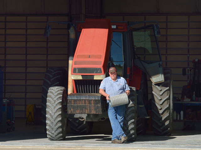 Justin Johnson, a technician at Heartland Tractor, a Case IH dealership in Nevada, Missouri, offers simple maintenance tips for the off season. (DTN/The Progressive Farmer photo by Jim Patrico)